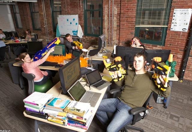 Marketing team reviewing an analytics dashboard in an office